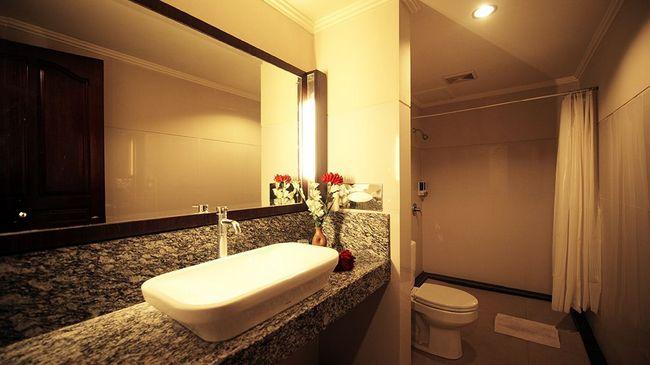 Urbanview Hotel Taman Suci Denpasar Habitación foto